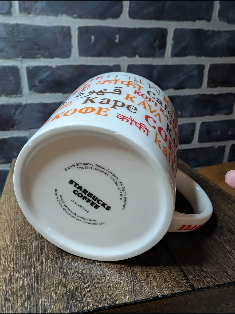 White and Red Coffee Mug with Multilingual 'Coffee' Design